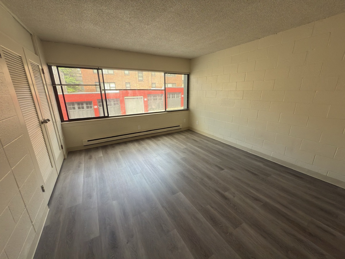The same apartment, empty, on move-in day